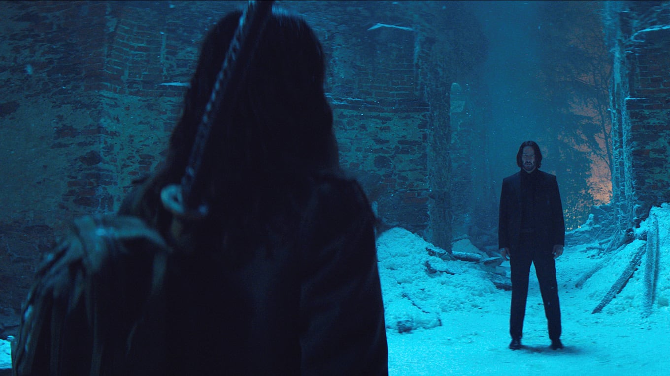 Szenenbild aus dem blutigen Actionfilm From the World of John Wick: Ballerina mit Ana de Armas und Keanu Reeves