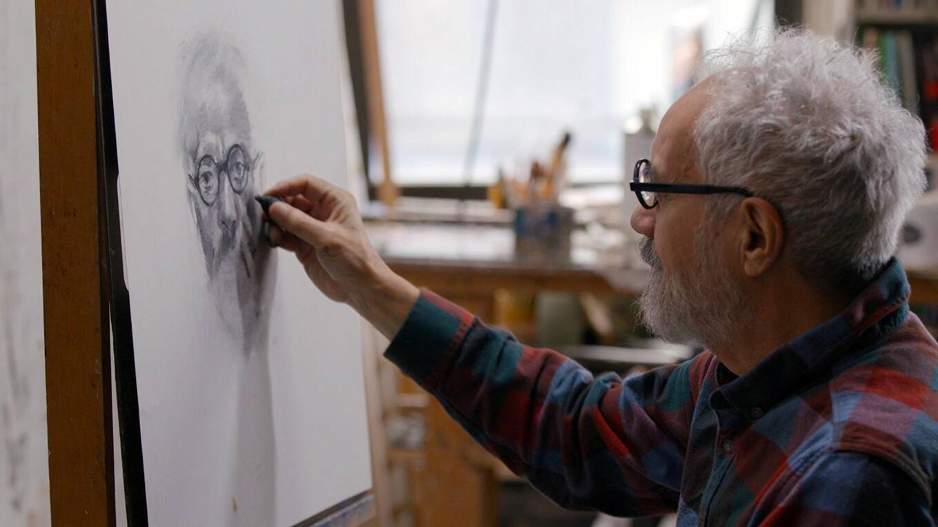 Künstler Nickzad Nodjoumi malt ein Selbstporträt